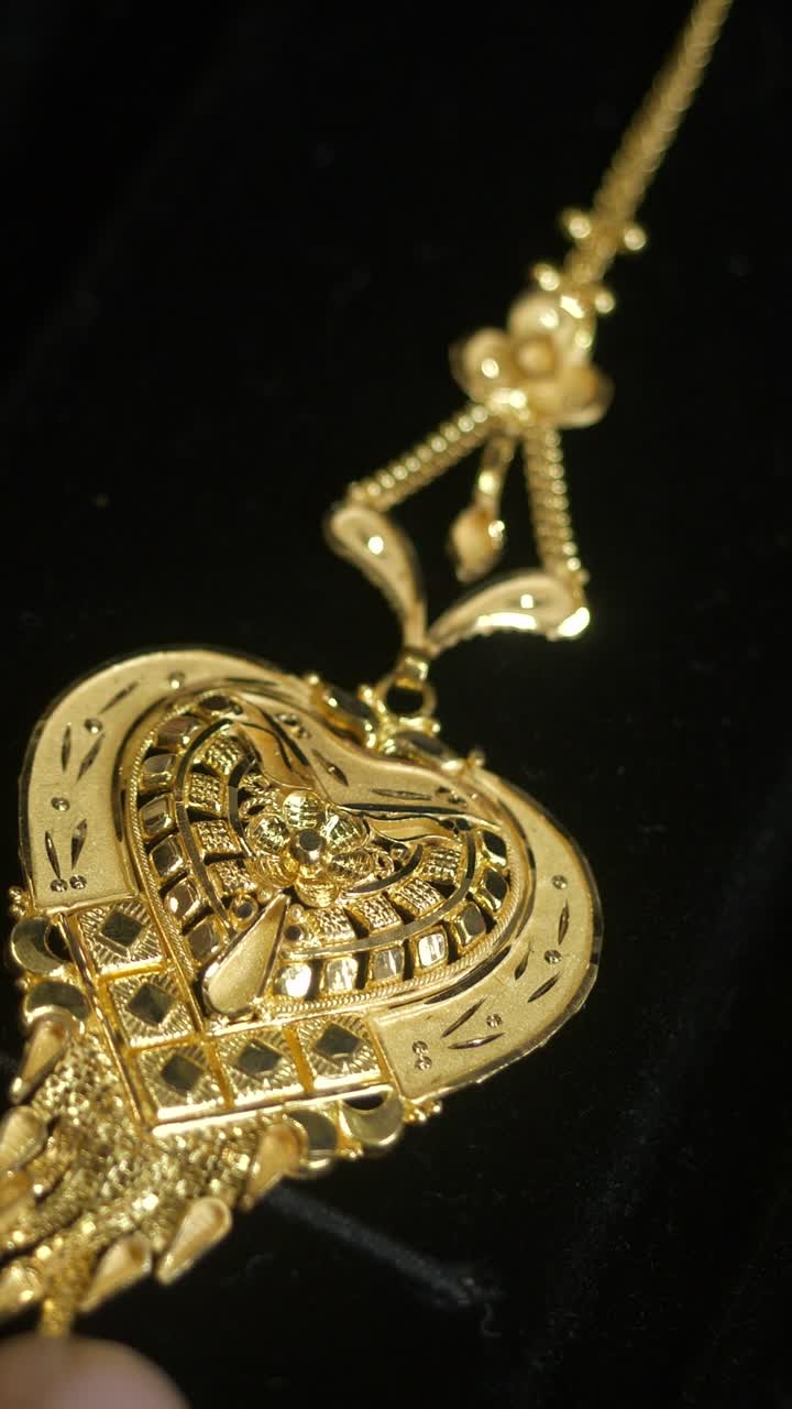 Closeup of designer head jewellery, 18k HUID certified gold jewellery, Vertical shot