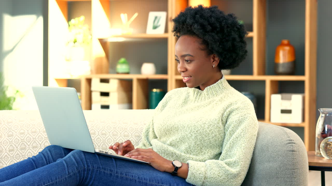 Freelance journalist or blogger typing on laptop