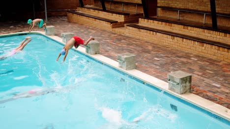 students swimming in the pool