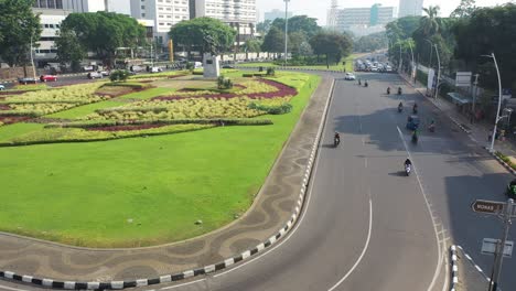 cityscape with roundabout and traffic