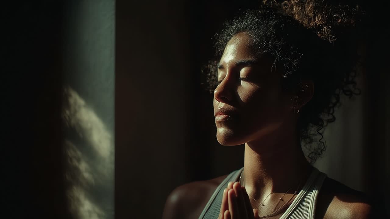 A Serene Moment of Contemplation and Mindfulness as a Young Woman Engages in Meditation with Eyes Closed, Embracing Inner Peace and Tranquility
