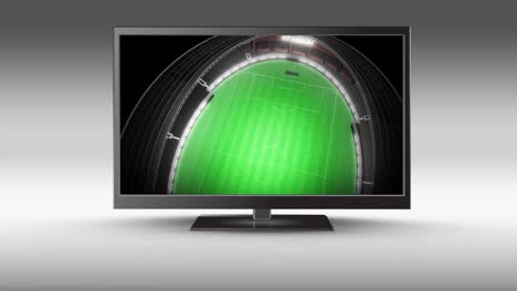 television with a stadium on its screen