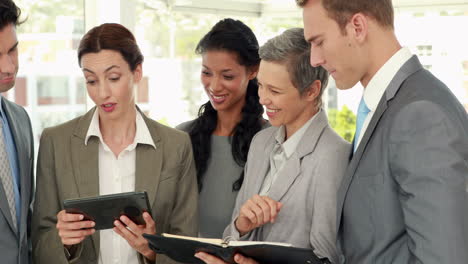 business people with tablet and notebook