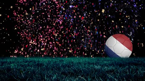 Animation-of-fireworks-over-soccer-ball-in-colours-of-french-flag