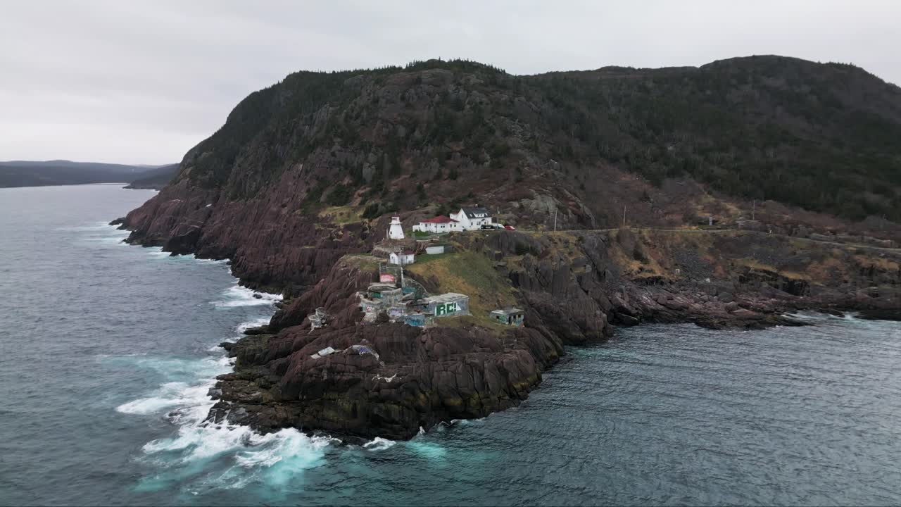 Drone shot of Fort Amherst in St John's, Newfoundland, Canada. Spinning around the point to reveal the coastline.