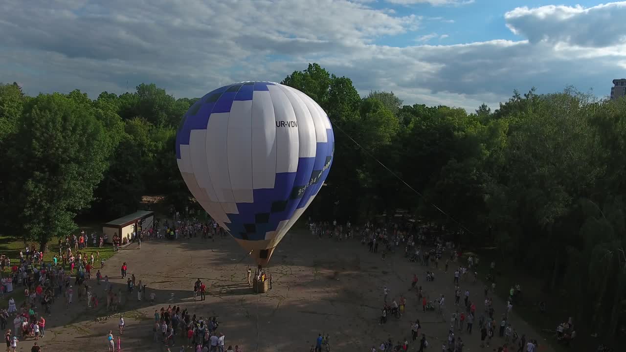 Balloon Waiting For Boarding. VINNITSA, UKRAINE - JULY 2017: Hot air color balloon balloon waiting for boarding at park