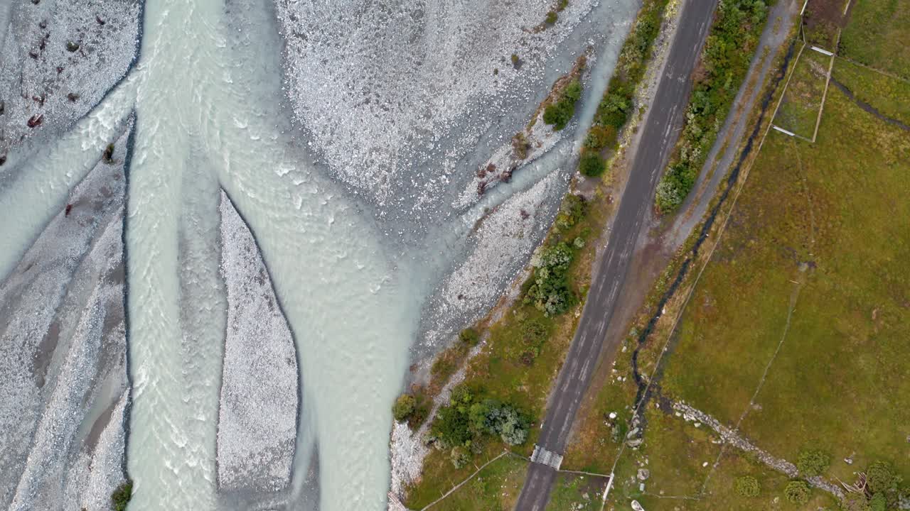 Ice cold white river in the untouched nature of Norway (Strynefjellet) aerial shot
