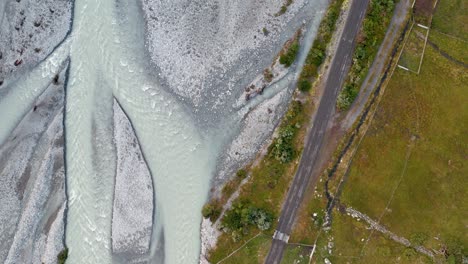 ice cold white river in the untouched nature of norway (strynefjellet) aerial shot