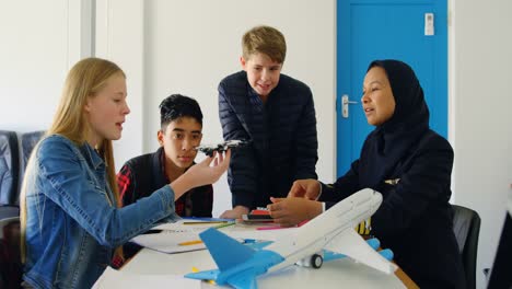 female pilot about model drone to kids 4k