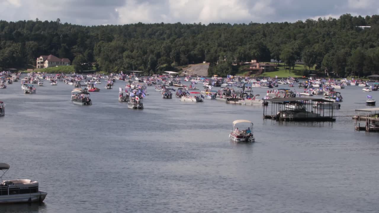 Boats decorated to support USA Trump Pence 2020. Hundreds of boats came out for the Trump 2020 boat parade on Lake Hamilton in Hot Springs.