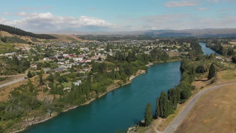 slowmo - aerial shot of historic town clyde in central otago, new zealand