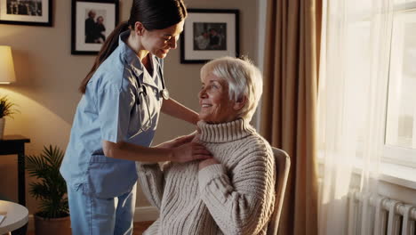 a caregiver assisting an elderly woman in her home