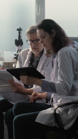 scientists reviewing data in a laboratory