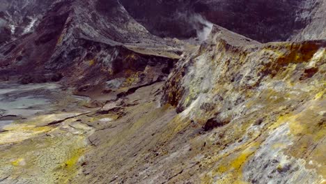 crater slope colored yellow from sulfur mineral, white island, aerial