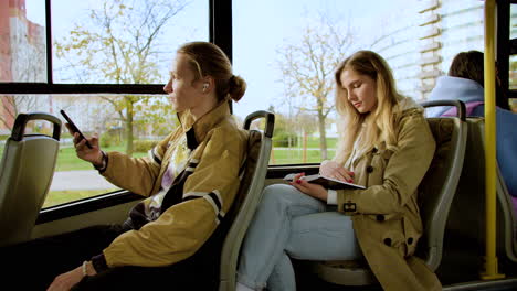 Young-people-sitting-in-the-bus