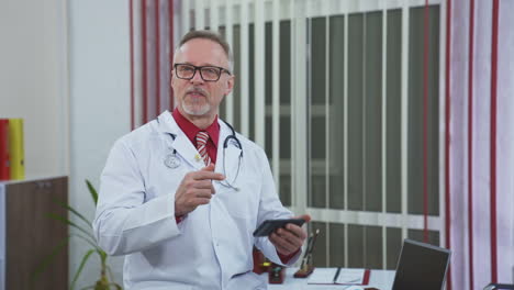 online consultation with doctor. professional doctor with smartphone giving online consultation