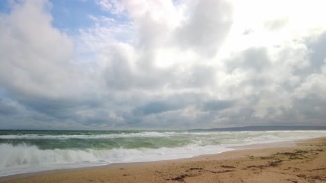 captures the ominous beauty of gathering clouds and turbulent waters