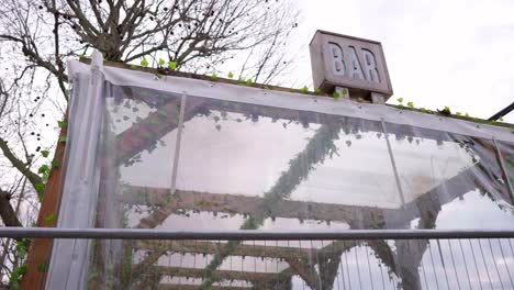 Closed-bar-by-river-Thames-in-London-during-the-Covid-19-Coronavirus-pandemic,-empty-seats-and-tables-during-lockdown