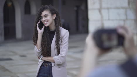photographer taking a photo of a woman