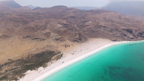 rocky cliff and mountains at shoab beach in socotra island, yemen - aerial shot