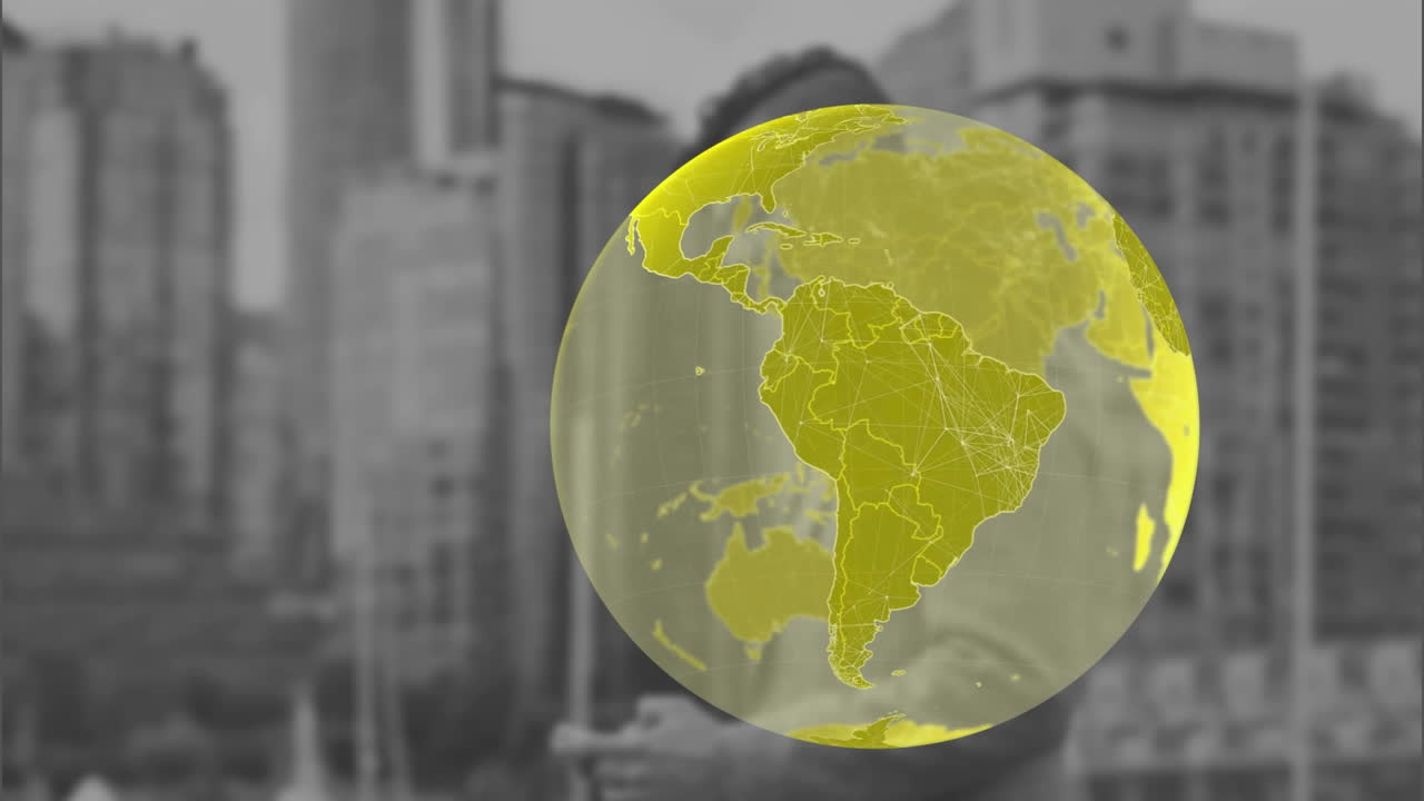 Animation of globe over caucasian businessman in city
