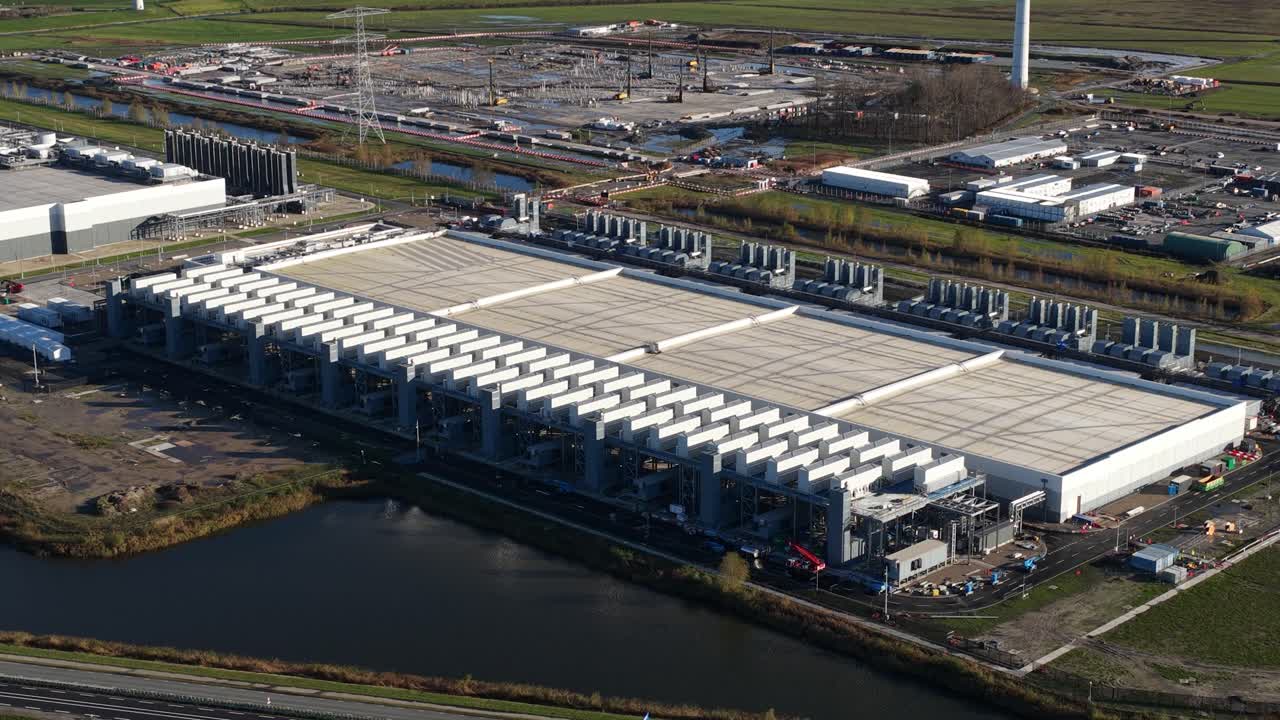 Aerial drone video of a hyperscale data center in Eemshaven, The Netherlands, highlighting internet services, big-data processing power, and large-scale digital infrastructure