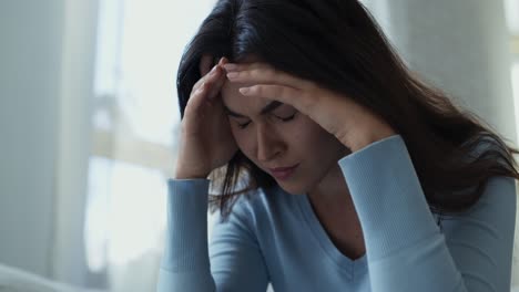 woman experiencing stress and anxiety