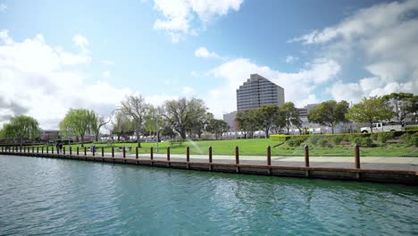 lake next to the park and the city