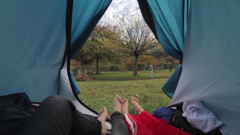 couple waking up together in camping tent pov shot