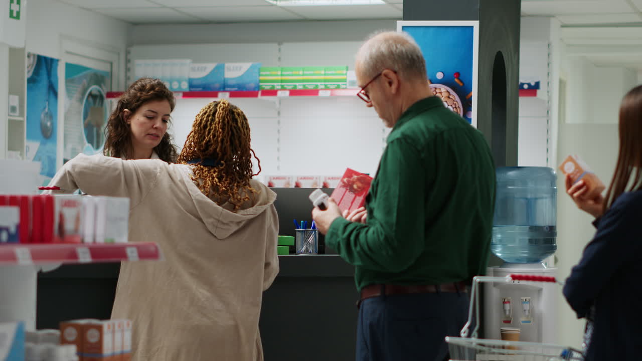 People at Pharmacy Buying Medication