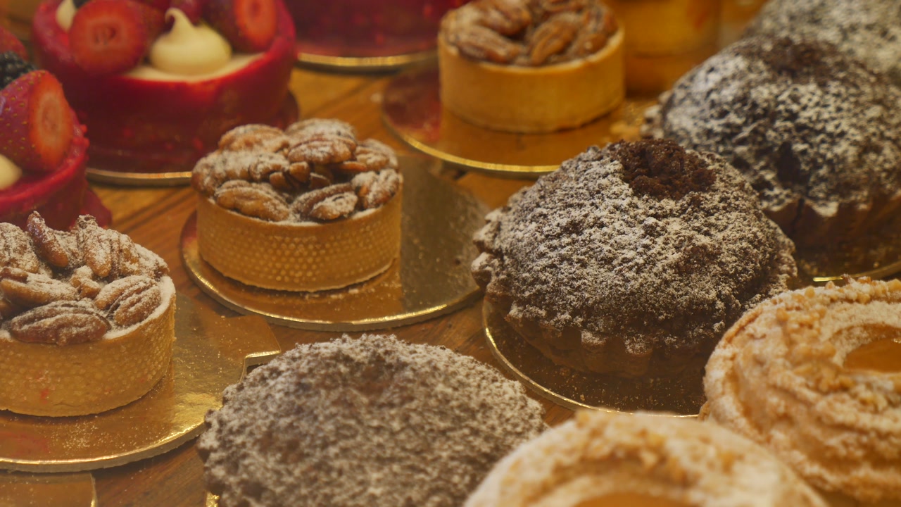 Close-up of Delicious Assorted Pastries and Desserts in a Bakery Display
