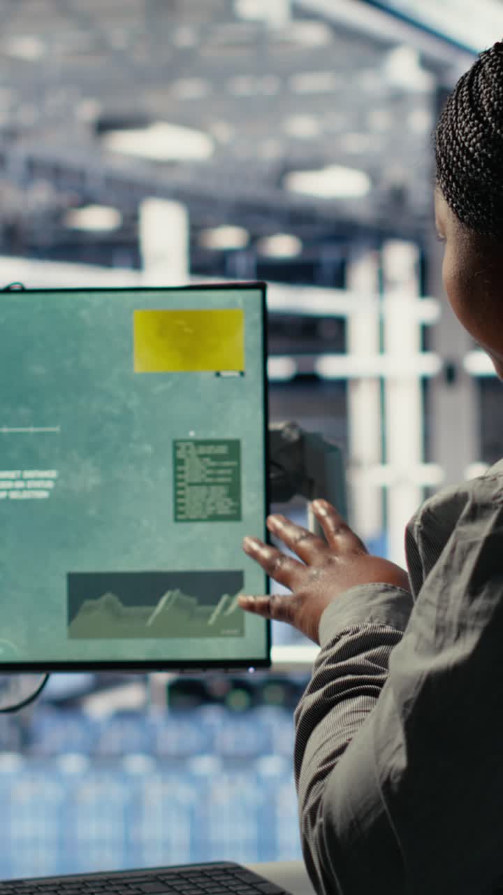 Vertical Video Military Data Center Coworkers Looking At Radar Software On Screen