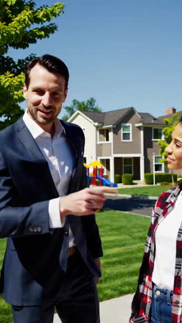 real estate agent showing property to client