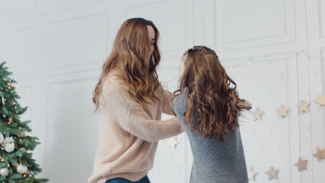 cheerful family jumping up and down on bed in luxury house together.