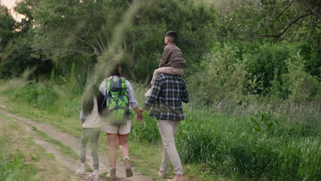 family hiking in the woods