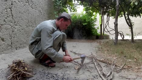 young man's stick chopping