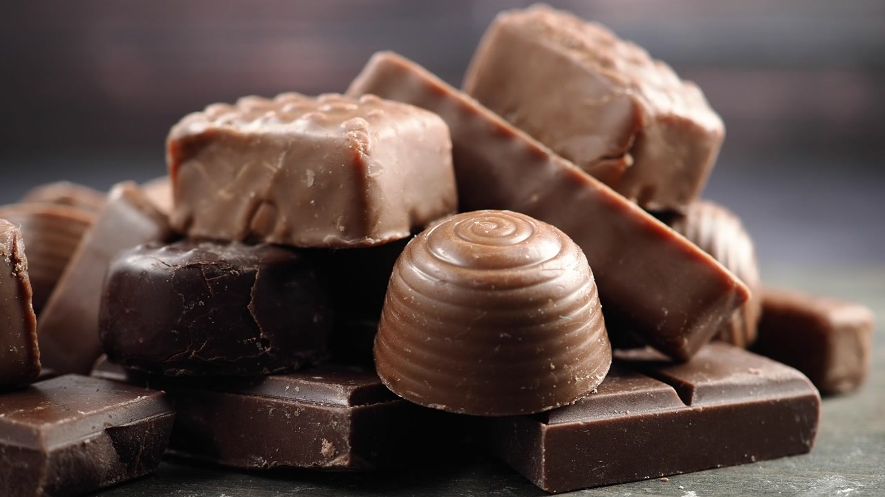 Close-up of Assorted Milk and Dark Chocolate Candies and Bars