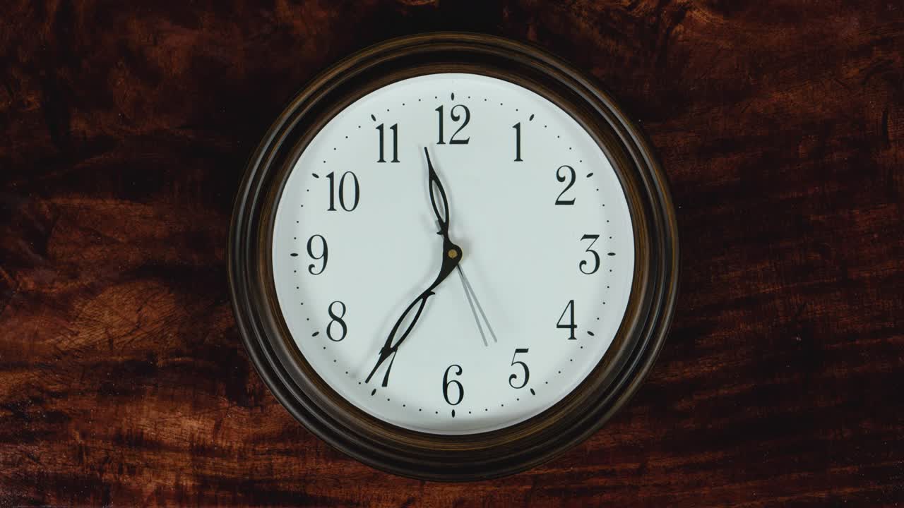 A clock hanging on the wall Timelapse 4k