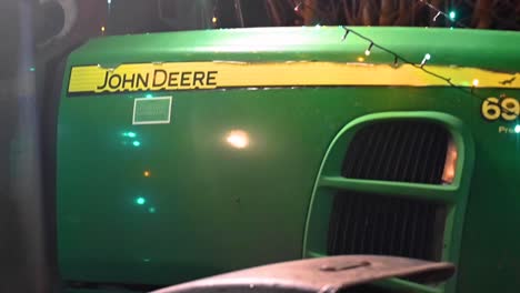 John-Deere-69-at-the-Festive-Hope-Tractor-Run,-Horseman's-Green,-Whitchurch,-United-Kingdom