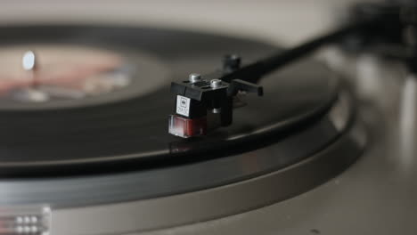 a closeup of a stylus on a record player