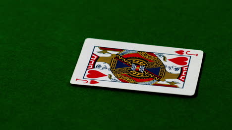 jack of hearts falling on casino table