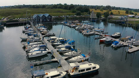 aerial shot of boats in marina in blotnik, pomeranian, poland