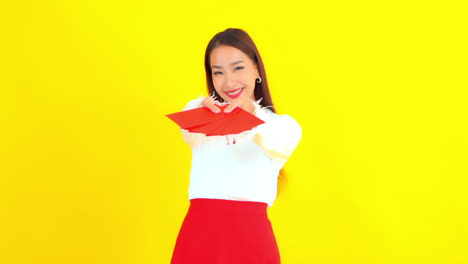 a pretty young businesswoman offers a fan of cards to the viewer