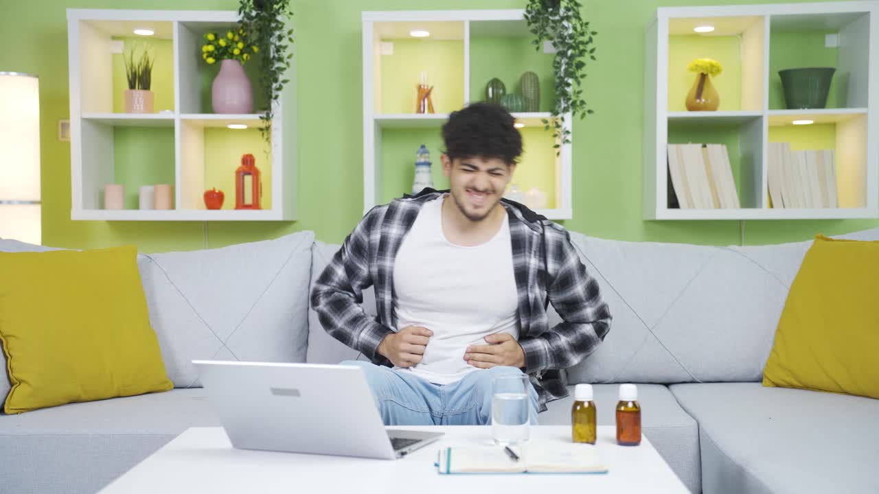 Young man with stomachache.