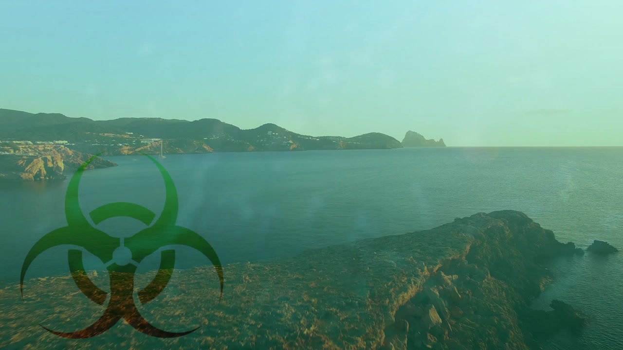 Green biohazard symbol floating over coastal scene, showing sailboat and rocky point in 3D render
