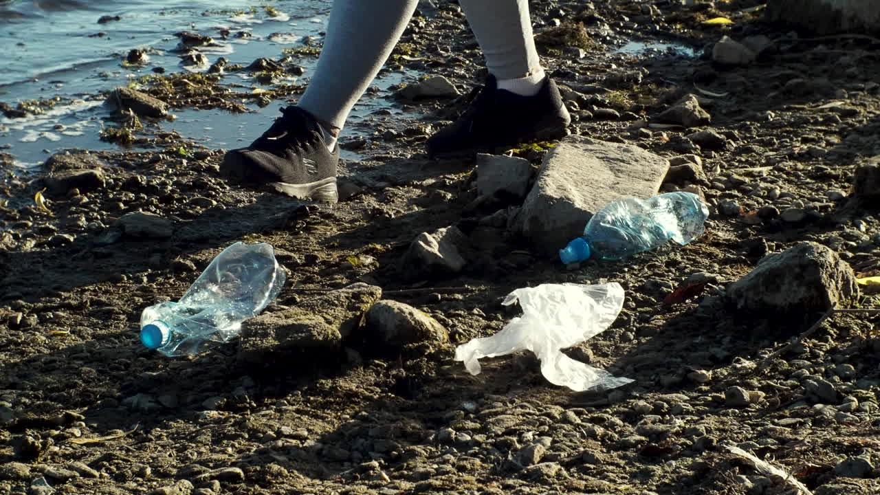 Cleaning up Plastic Pollution on a Riverbank