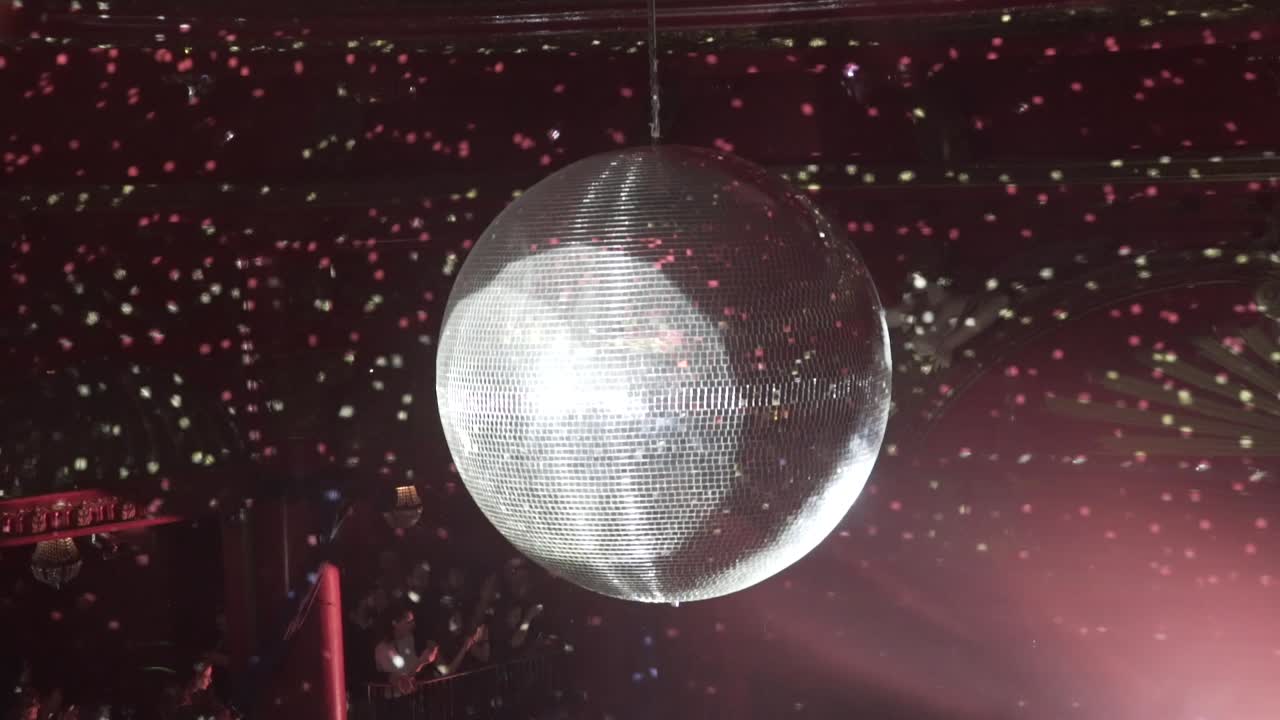 huge disco ball in slow motion on a club in London 4