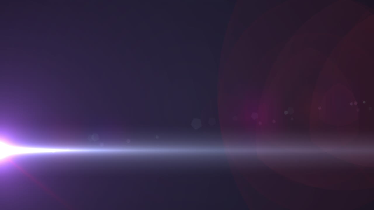 Raggio di luce bianco e particelle rosa che si muovono nel cielo notturno