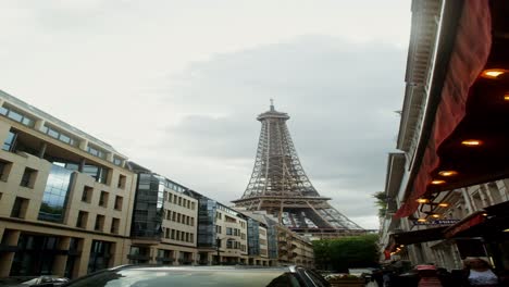 eiffel tower view from parisian street