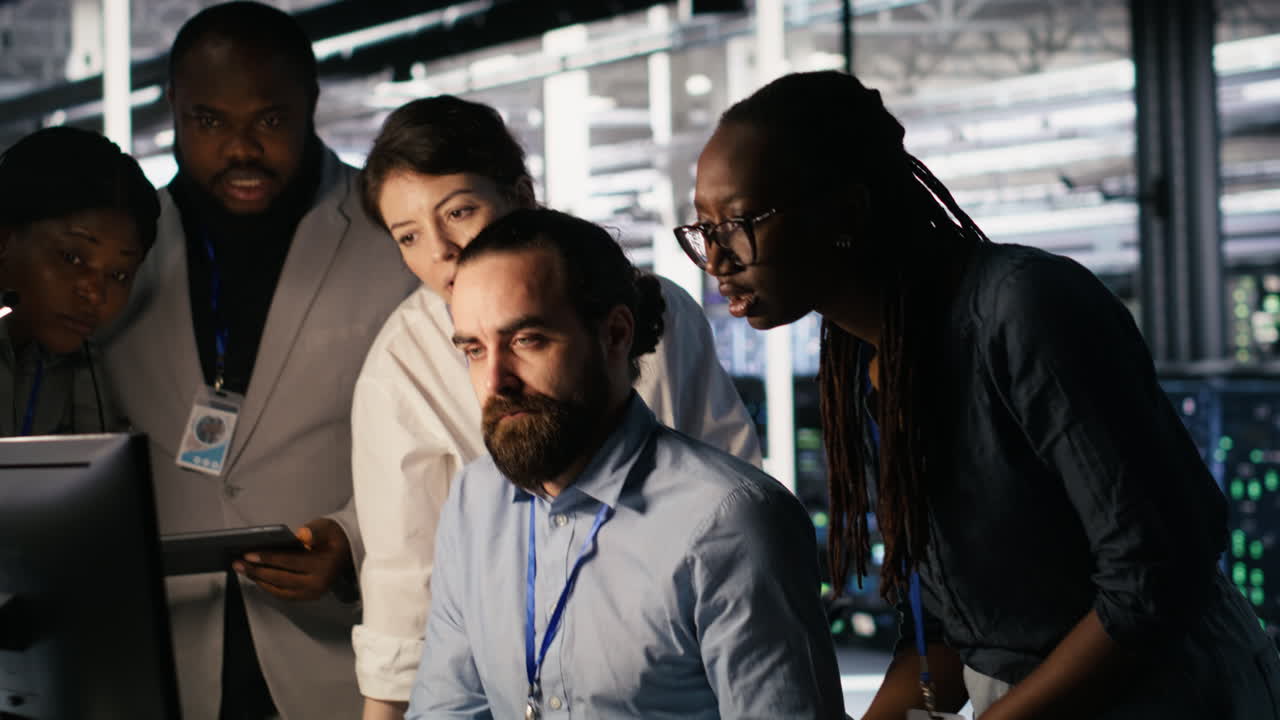 Vertical video Admins doing brainstorming in server hub, reviewing machine learning code